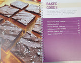 cookbook interior pages featuring a table of contents for baked goods recipes, as well as a picture of a batch of desserts.