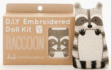 D.I.Y Embroidered Doll Kit with raccoon design on cardboard packaging.