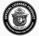 Circular logo with Smokey Bear wearing a hat, labeled 'Official Licensed Product' and 'Cooperative Forest Fire Prevention'.