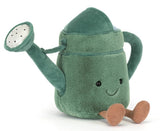 Green plush watering can toy with brown legs.