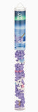 Tall cylindrical tube filled with small purple and white puzzle pieces, branded 'Plus-Plus' and narwhal.
