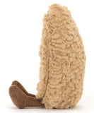 Heart-shaped beige plush toy.