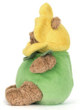 Brown plush teddy bear dressed in a yellow and green daffodil costume.
