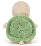 Green and beige plush toy.