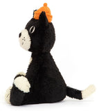 Black and white plush toy cat with an orange cap and smiling expression.