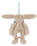 Plush beige bunny wearing a large light blue bowtie, suspended by a light blue ribbon ornament hanger.