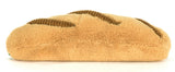 Tan hoagie bread plush toy on a white background.