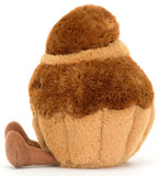 Plush toy brown muffin with a smiling face and corduroy legs.