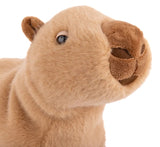 Plush toy Capybara with tan fur and brown ears, snout, and feet.