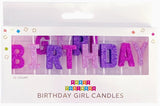 Packaging of Birthday Girl candles with pink and purple text on a white background.