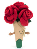 Plush toy flower bouquet with red roses and a smiling face.