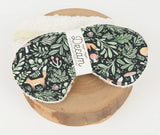 Sleep mask with nature-themed design  with "Dream" on label